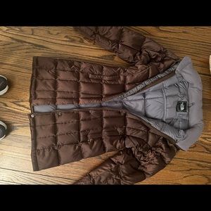 Brown north face jacket to thigh